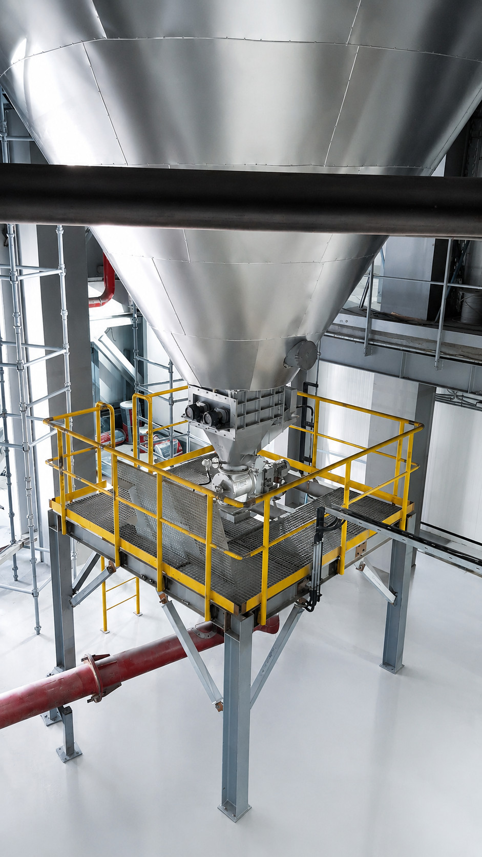 Industrial manufacturing process with molten metal and heavy machinery